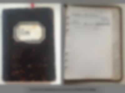 Grey background with two images. On the left, a notebook cover. There is a white box in the middle, where 
