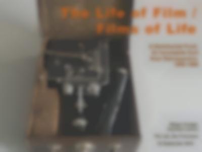 Open case with a film camera stored inside. Several information has been written over it digitally, on the right side of the photo. At the top 