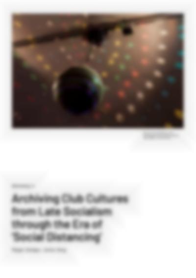 A photograph of a mirror ball, reflecting lights in different colours on the ceiling, occupies the top half of a white page. At the bottom, large black text reads: 