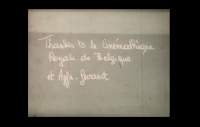 On top of a grey background, possibly a wall, the following text has been handwritten: 