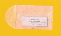Mustard yellow paper with a see-through shape consisting of a rectangle and a semicircle. Inside the rectangle, there is a small, rectangular piece of white paper with the following text: 