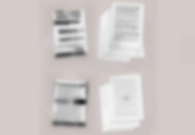 Four stacks of word documents have been imposed digitally on a beige background.